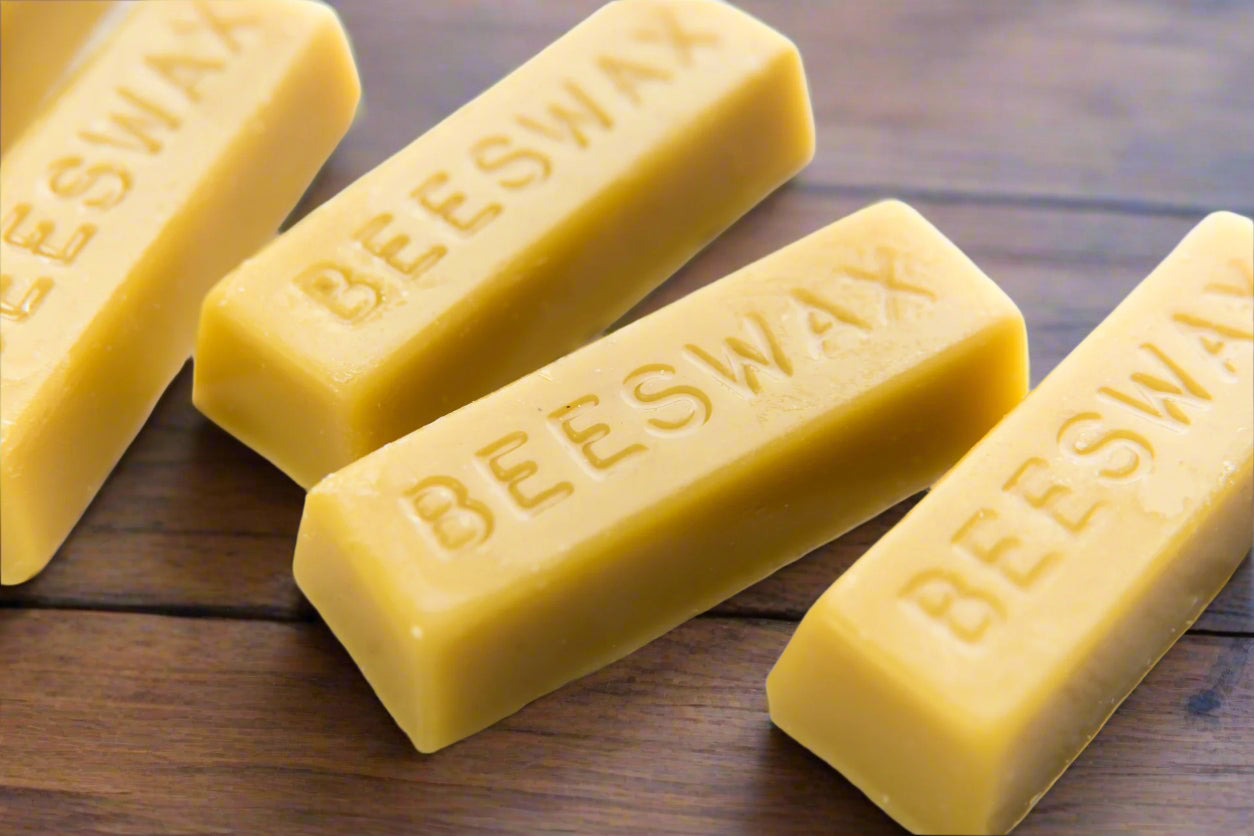 Pure beeswax for beeswax candles on wooden table | NoCo Apothecary