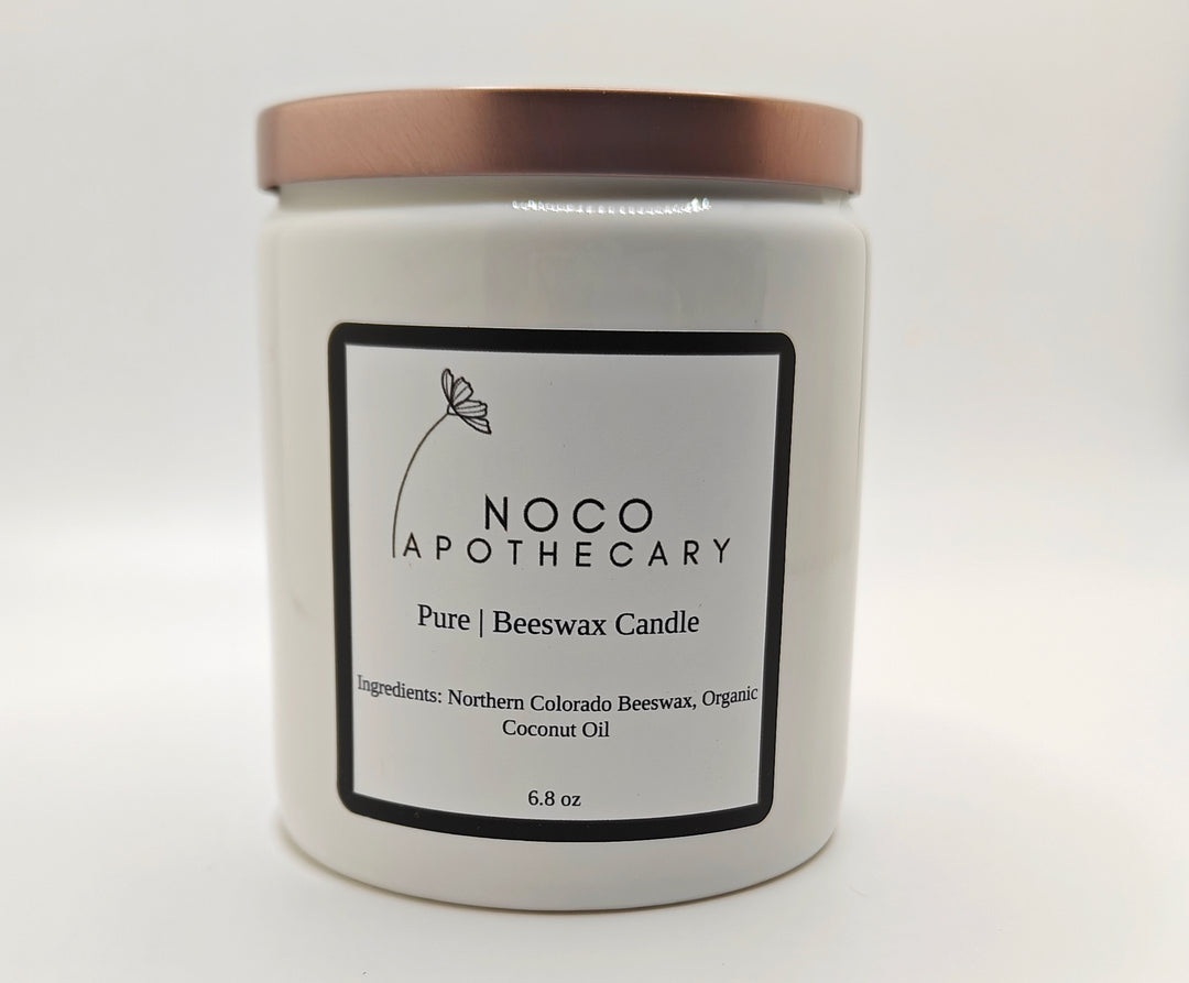 Pure beeswax candle against white background | NoCo Apothecary