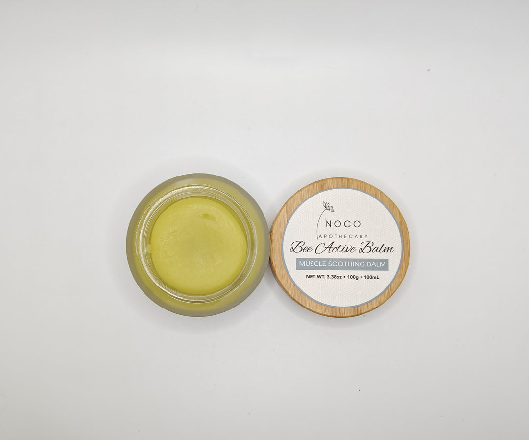 Top view of Bee Active Balm against white background | Muscle Balm | Colorado Skincare