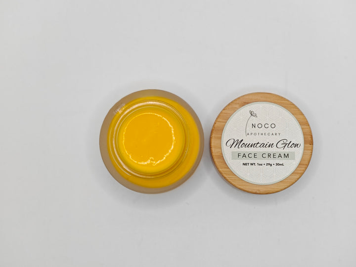 Top view of Mountain Glow Face Cream against white background | NoCo Apothecary | Natural Lotion