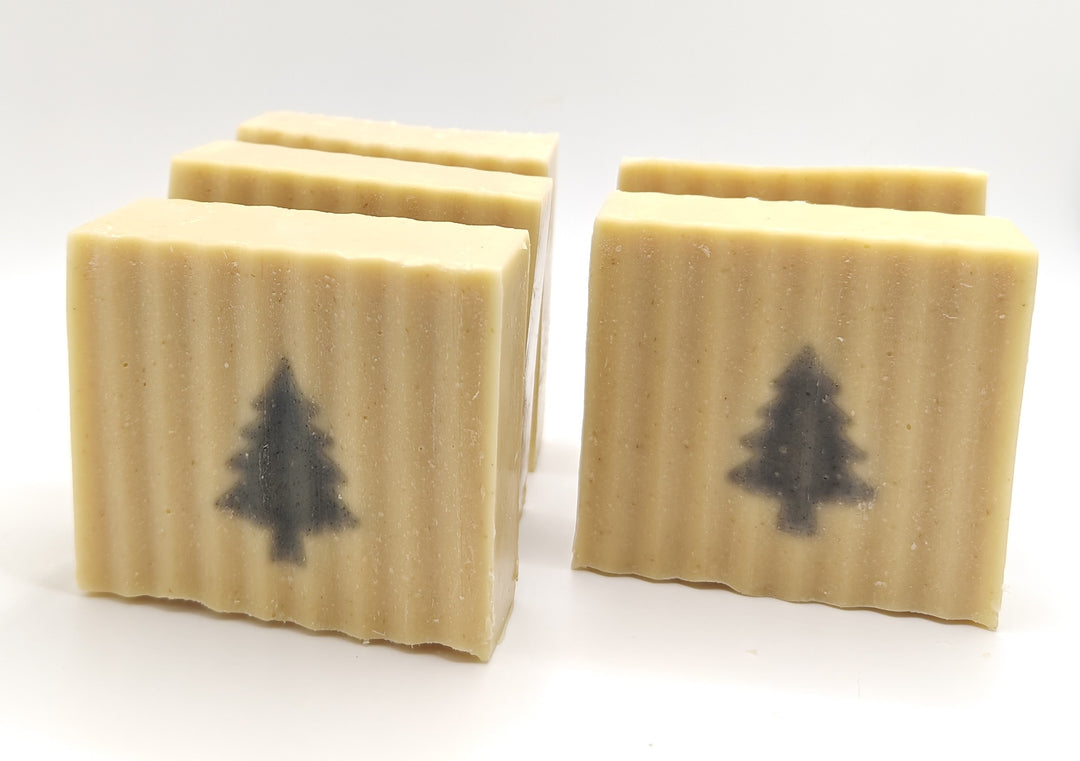 Several soaps with Christmas Trees in the center against white background | Tallow Soap | Colorado Skincare